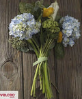 Bouquet secured with One Wrap Garden Ties For Plants And Staking Reusable Adjustable Plant Supports With Gentle Non Slip Grip Cut To