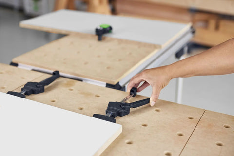 Clamping Elements 2 Pack for Precise Workpiece Fixing in Woodworking on a perforated workbench with hand adjusting clamp