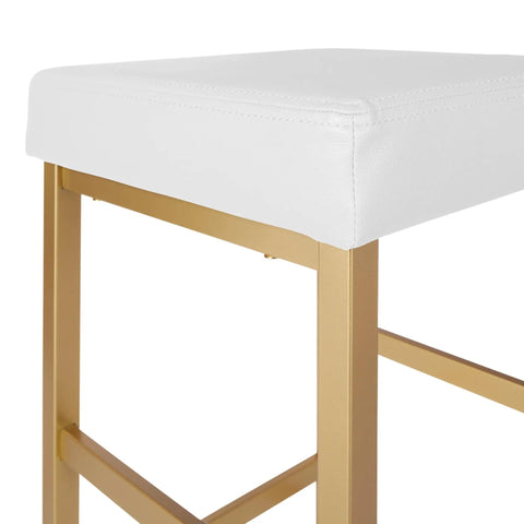 Close-up of Backless Bar Stool With Gold Frame And White Vinyl Cushioned Seat 30 Inch Counter Height showing gold finish legs