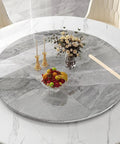 Top Shelf Premium Gray Marble Lazy Susan With 12 Millimeter Thick Round Serving Tray on dining table with fruits and decor
