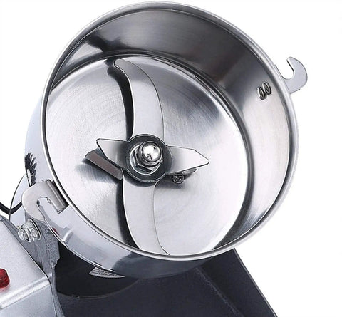 Close-up of Stainless Steel Electric Grain Grinder Pulverizer chamber, commercial-grade kitchen gadget with durable blades.