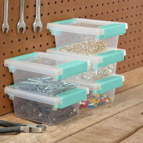 12 Pack Clip Box Stackable Clear Plastic Storage Bins With Latching Lids For Small Items Organization At Home, Office, Classroom, Crafts And Workshop Spaces, shown stacked with tools.