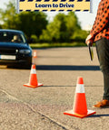 18 Inch Traffic Safety Cones 12 Pack Orange PVC With Reflective Collars in use at driving lesson, visible car and student