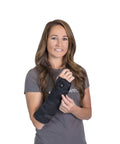 Woman wearing Ambidextrous Wrist Brace With Adjustable Malleable Aluminum Cuffs For Wrist Forearm And Arm Support Relieves Carpal Tunnel Tendonitis Pain All Day Comfort Universal Left Or Right Fit