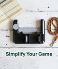 Golf Cart Steering Wheel Phone Holder With Flip Up Design And Scorecard Slot, pen and cord on wooden table