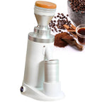 Top Tier Heavy Duty Electric Coffee Bean Grinder With Sixty Four Millimeter Burrs And Eight Stepless Settings For Espresso French Press Or Turkish Coffee Next Level Daily Grinds White 350 Grams with coffee beans and ground coffee.