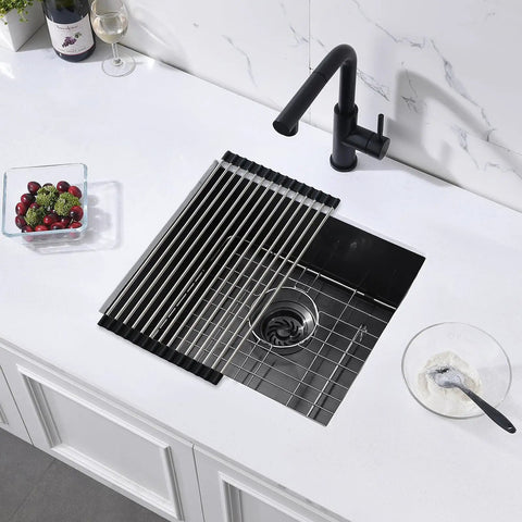 Top view of undermount kitchen bar sink 18 x 16 x 9 inches black stainless steel with rolled mat and grid in modern kitchen setup.