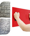 Person holding the Lightweight Workhorse PU Concrete Stamp Mat With Handy Handles For Seamless Floor And Wall Stamping, 27.5x15.7x0.8 inches.