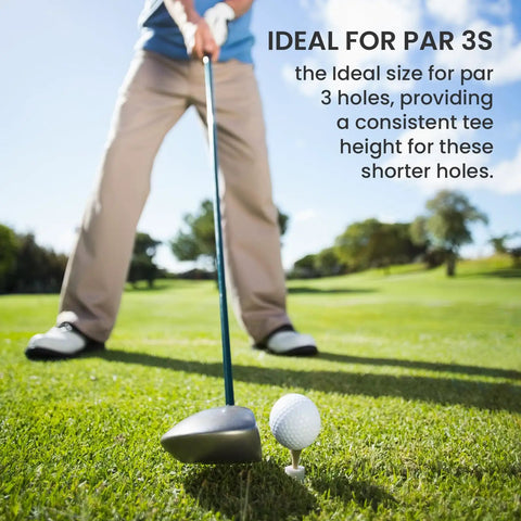 Golfer preparing to swing with Five Pack 1.5 Inch Rubber Tee Adapters For Indoor Outdoor Golf Practice Mats White Tee Holder Set Fits Wood And Plastic Tees Durable Universal Tee Support For Hitting Mats And Range Ready on a golf course.
