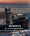 M14x1.5 Lug Bolts Set For Audi And Volkswagen OEM Rims 20 Pieces 28mm Shank shown on rock, black finish
