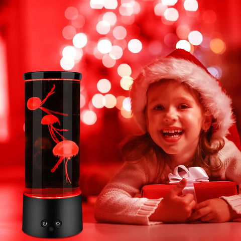 Lava Lamp Style Night Light With 16 Color Changing RGB LEDs next to a smiling child in festive setting with warm lighting.
