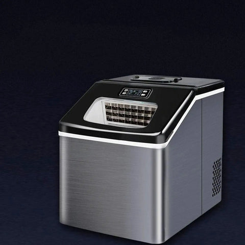 Heavy Duty Countertop Ice Maker With Rapid Freezing And Forty Pounds Daily Output Perfect For Home Bars And Kitchens Compact Stainless Steel Design showing front view with control panel.