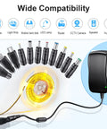Universal 48W AC DC Power Adapter With 11 Interchangeable Tips Multi Voltage 5V 6V 7.5V 9V 12V 15V 19V 20V 100 To 240V Input USB C Output 5.5 Mm By 2.1 Mm Barrel Included showcasing tips with wide device compatibility.