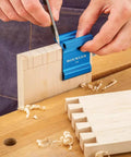 Person using Dovetail Saddle Square 1 To 6 9.5 Degree Angle Marking Tool For Softwoods on wood with comfort grip for clean joints