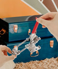 Beefy Heavy Duty Toggle Latch Clamp with strong grip being installed on storage chest, durable metal latch clip
