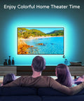 Family watching TV with Led Backlight Kit For 60-65 Inch TVs, 15 Ft Behind Monitor Lights, Bias Lighting creating ambient glow