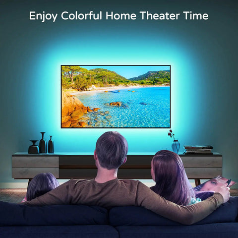 Family watching TV with Led Backlight Kit For 60-65 Inch TVs, 15 Ft Behind Monitor Lights, Bias Lighting creating ambient glow