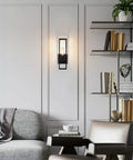 Dang Stylish Vintage Industrial Wall Sconce Lights With Solid Iron Frame Hella Bright LED Wall Lamp illuminating a modern living room corner.