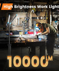 Rechargeable Work Light With Stand, Triple LED Heads For Boss Level Lighting in workshop with welder, 67 Inch Tripod visible