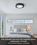 Bedroom with Matte Black Flush Mount Ceiling Light With White Frosted Glass Shade Two Light Round Metal Fixture 13 Inch