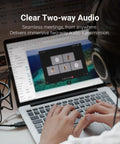 Person using Comet Pro Remote KVM Over WiFi Dual Band WiFi 6 Desktop KVM With 4K At 30 FPS Passthrough on laptop with audio setup