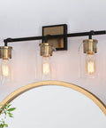 Black And Gold Modern Farmhouse Vanity Light With Copper Accent Socket And Back Plate Three Clear Glass Shades 19.7 Inch Bar Easy Install Bathroom Lighting That Elevates Your Space To A Killer Vibe over a round mirror with plants