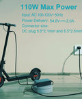 54.6V 2A Fast Charger For 13S Li-ion Battery, Safe Smart Charging For 48V E-Bikes And Scooters next to an e-scooter