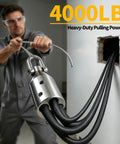 Real Deal Heavy Duty Wire Pulling Grip Four Slot Cable Puller Tool With Four Thousand Pound Capacity For Pro Electrical Conduit Runs And Underground Wiring Jobs Across The Nation, close-up of stainless steel grip in use.