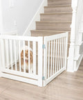 360 Hinges Freestanding Dog Gate With Walk Through Door For Home Use Up To 76 Inches Wide, Two Way Swing, shown near staircase