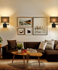Living room with two Swing Arm Wall Lamp With Dimmer And USB Port Wall Sconce Black Fabric Shade For Bedroom Living Room And Nurse Room Creates Cozy Mystical Atmosphere With Plug In Cord, above sofa.