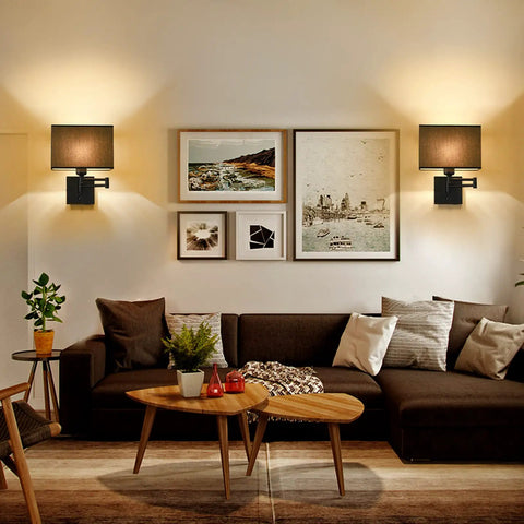 Living room with two Swing Arm Wall Lamp With Dimmer And USB Port Wall Sconce Black Fabric Shade For Bedroom Living Room And Nurse Room Creates Cozy Mystical Atmosphere With Plug In Cord, above sofa.