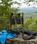 Lightweight Aluminum Pack Frame for Hiking and Backpacking Gear on stone ledge, green frame, black backing, for 75 kg load