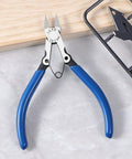 Precision Flush Cutters And Wire Cutters For Electronics And DIY Projects with blue handles on gray surface