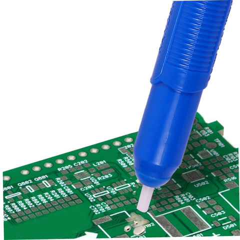 Desoldering Pump Solder Sucker For PCB Repair And Solder Removal Tool DIY Friendly Easy Grip Desolder Gun in use on green circuit board