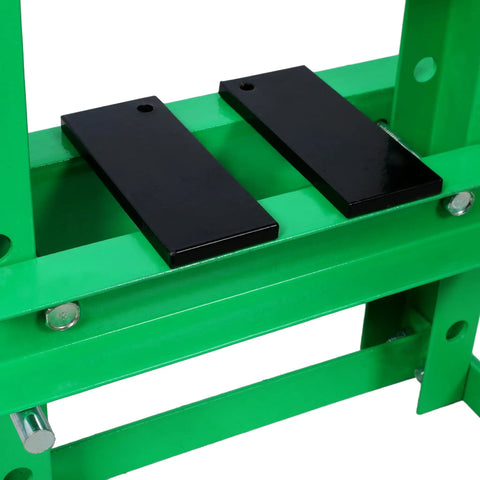 Close-up of green 6 Ton H Frame Hydraulic Shop Press with Adjustable Working Table, Plates, and Height for auto repair.