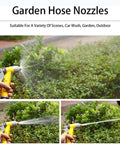 Garden Hose Nozzles in use, watering shrubs; Heavy Duty Stainless Steel Hose Reel Built Like A Tank For Garden Yard And Car Wash Top Notch Industrial Water Organizer That Is Dead Simple To Mount And Honestly Just Gets The Job Done Daily.