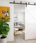 7ft Ceiling Mount Sliding Barn Door Hardware Kit For 42 Inch Wide Wooden Door, No Fuss Setup, Smooth Quiet Operation, I Shape Hangers, Heavy Duty Steel Construction, Anti Corrosion Finish, 220 Lb Weight Capacity, installed white door view