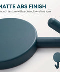 Close-up of a matte ABS finish on a wall hook, showcasing a smooth texture and a decorative design for 15 Pack Self Adhesive Wall Hooks With Hella Strong Grip No Drilling Damage Free Mounting For Towels Keys And Flatware Decorative Cutesy Style Perfect For Bathroom Office Or Closet Super Easy Setup And A Surefire Storage Winner.