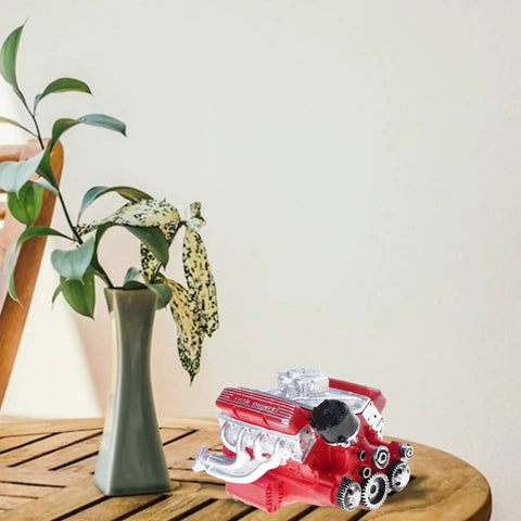 Full Scale Engine Display Model For Adults And Kids, Precision STEM Kit For Gearheads And Collectors, Hands On Build Toy With Realistic Engine Dimensions, Educational Automotive Engineering Project For Enthusiasts. Red resin engine model on a table