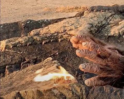 6-Inch Hemp Fire Starter Rope for Campfires in use on rocky ground with visible flames, windproof and waterproof features displayed.