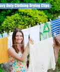 Hot Clear Balloon Arch Clips 20 Pack Ultra Strong Spring Clamps For Epic Birthday Decor Backdrop And Party Setup Easy Grip Versatile Art Crafts. Clear clothing drying clips holding laundry on an outdoor line.