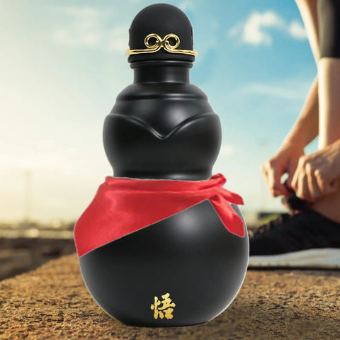 900ml Hydration Bottle With Gourd Inspired Shape For Hikers And Campers Grab And Go Ready with red sash outdoors.