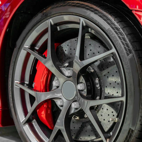 Close-up of alloy wheel with Alloy Wheel Hub Flange Bolts And Nuts Kit For ATV And Go Kart Easy Install Heavy Duty Screws visible.