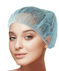 Model wearing Blue 21 Inch Disposable Bouffant Cap Hairnet Non Woven Non Pleated Case Of 1000 For Medical Labs Nurses Tattoo