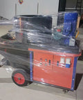 Heavy Duty Construction Wall Render Spraying Machine wrapped for transport, featuring controls and wheels for mobility.