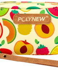 Small wristlet pouch with colorful fruit print and leather strap.