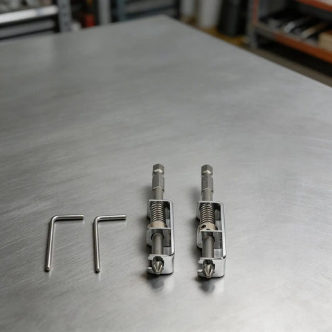 Super Cool Spring Loaded Screwdriver Bit Extension With Non Magnetic Grip For Slotted And Phillips Torx Bits In Silver. This One-Handed Pro Repair Tool Is A Total Game Changer For Fastening Jobs And Keeps Fasteners Secure While You Work Hard On Any Tough. silver spring-loaded bit extensions with two hex keys