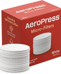 Premium White Paper Micro Filters Biodegradable Coffee Insert Chlorine Free Brew Accessory Ultra Thin Compostable Strainer stacked in a bundle.
