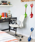 Three Piece Metal Beach Shovel Set For Kids, 16 Inch Sand Shovels With Wooden Handles, displayed in a kids' room
