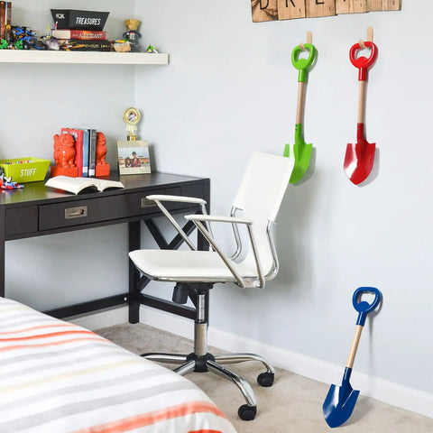 Three Piece Metal Beach Shovel Set For Kids, 16 Inch Sand Shovels With Wooden Handles, displayed in a kids' room